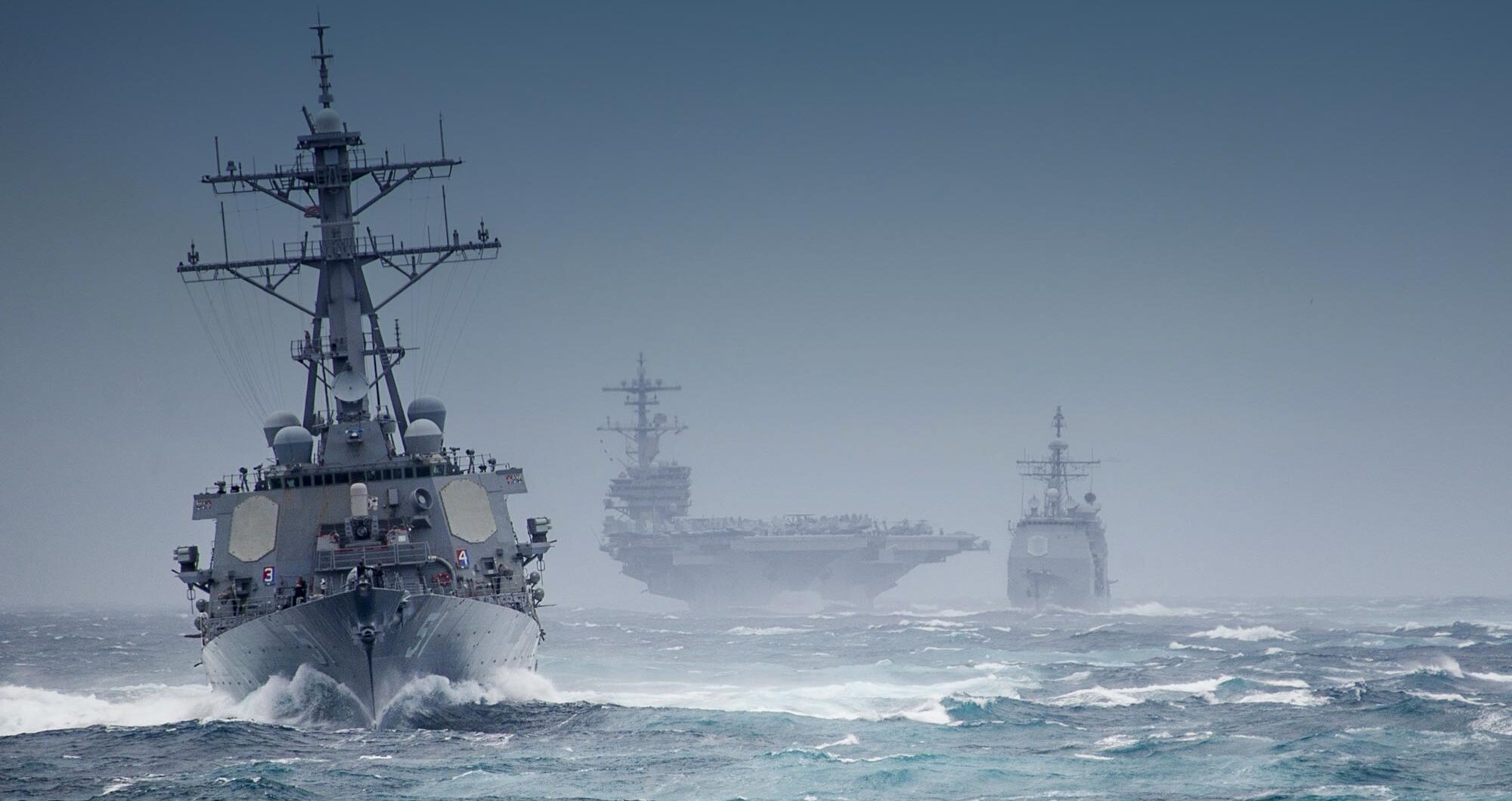 naval-warship-and-aricraft-carrier-on-choppy-sea
