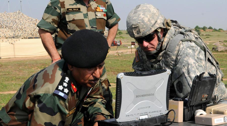 military-men-looking-at-laptop